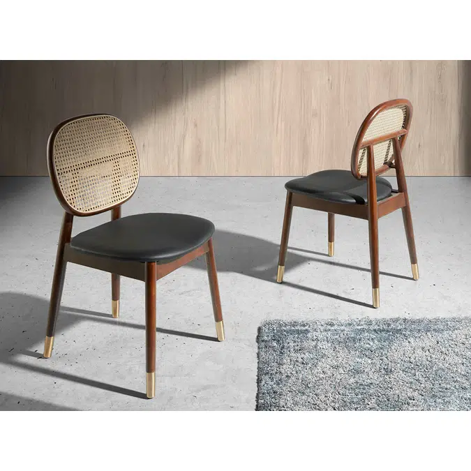 Chair upholstered in leatherette with rattan backrest and walnut wood legs