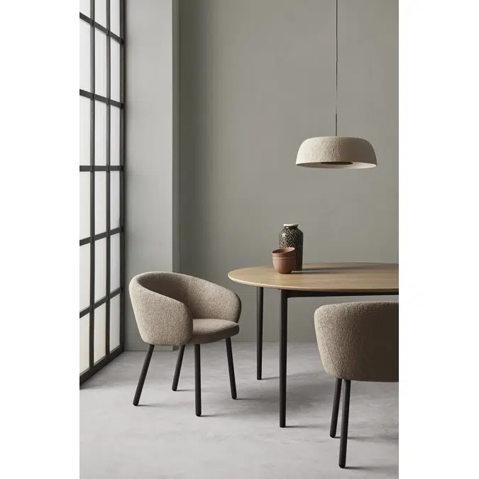 Huma upholstered armchair with metal legs