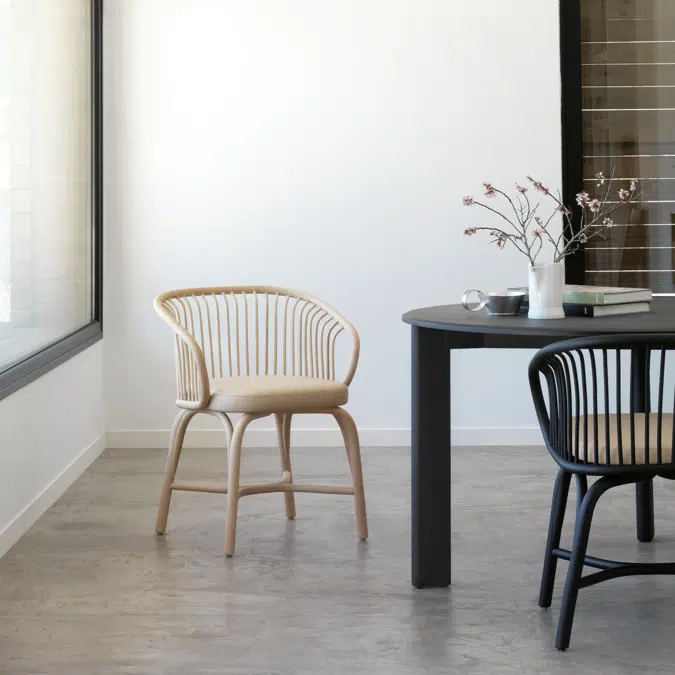 Huma dining armchair with rattan legs